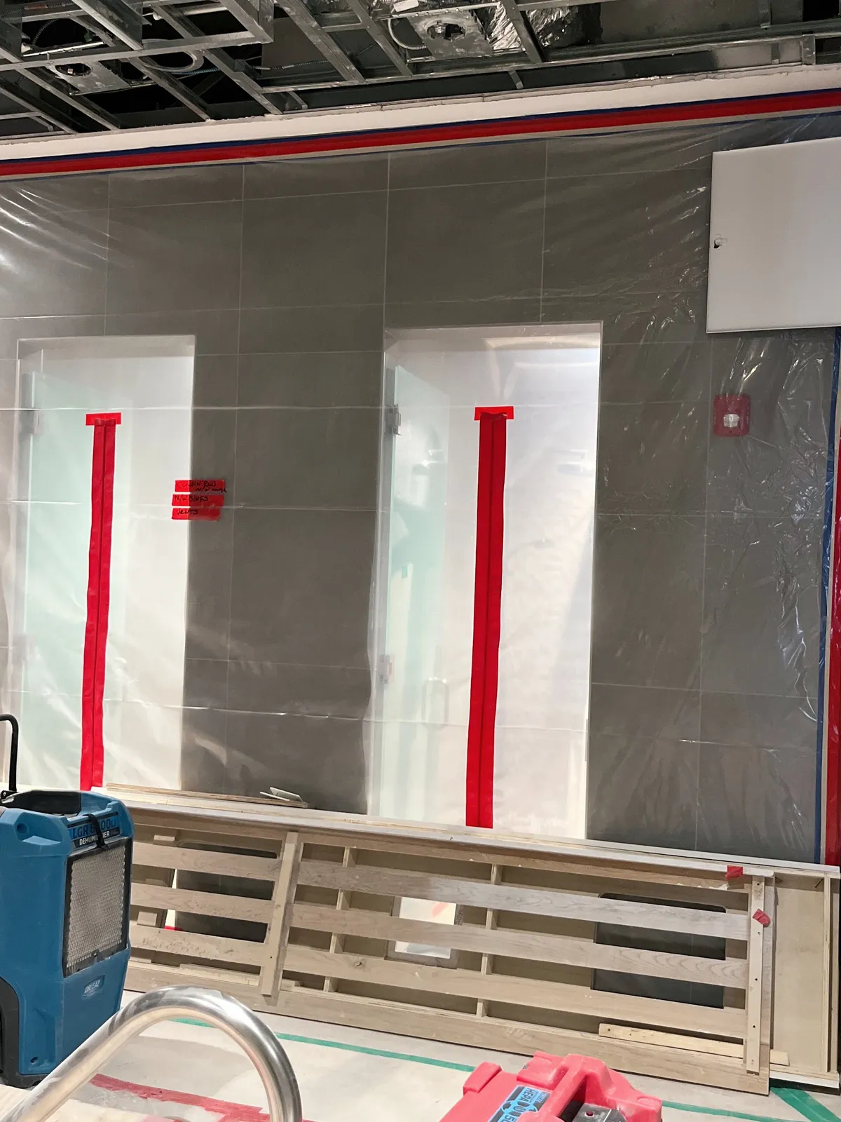 Containment barrier during build-back reconstruction