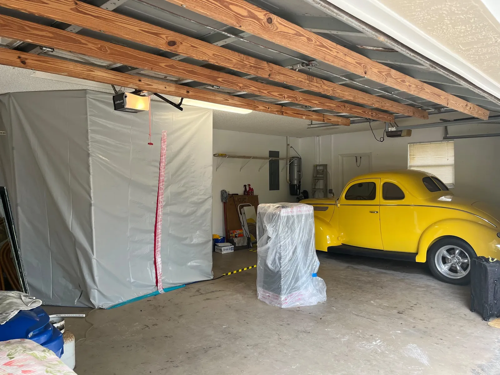 Containment tent set up in a residential garage