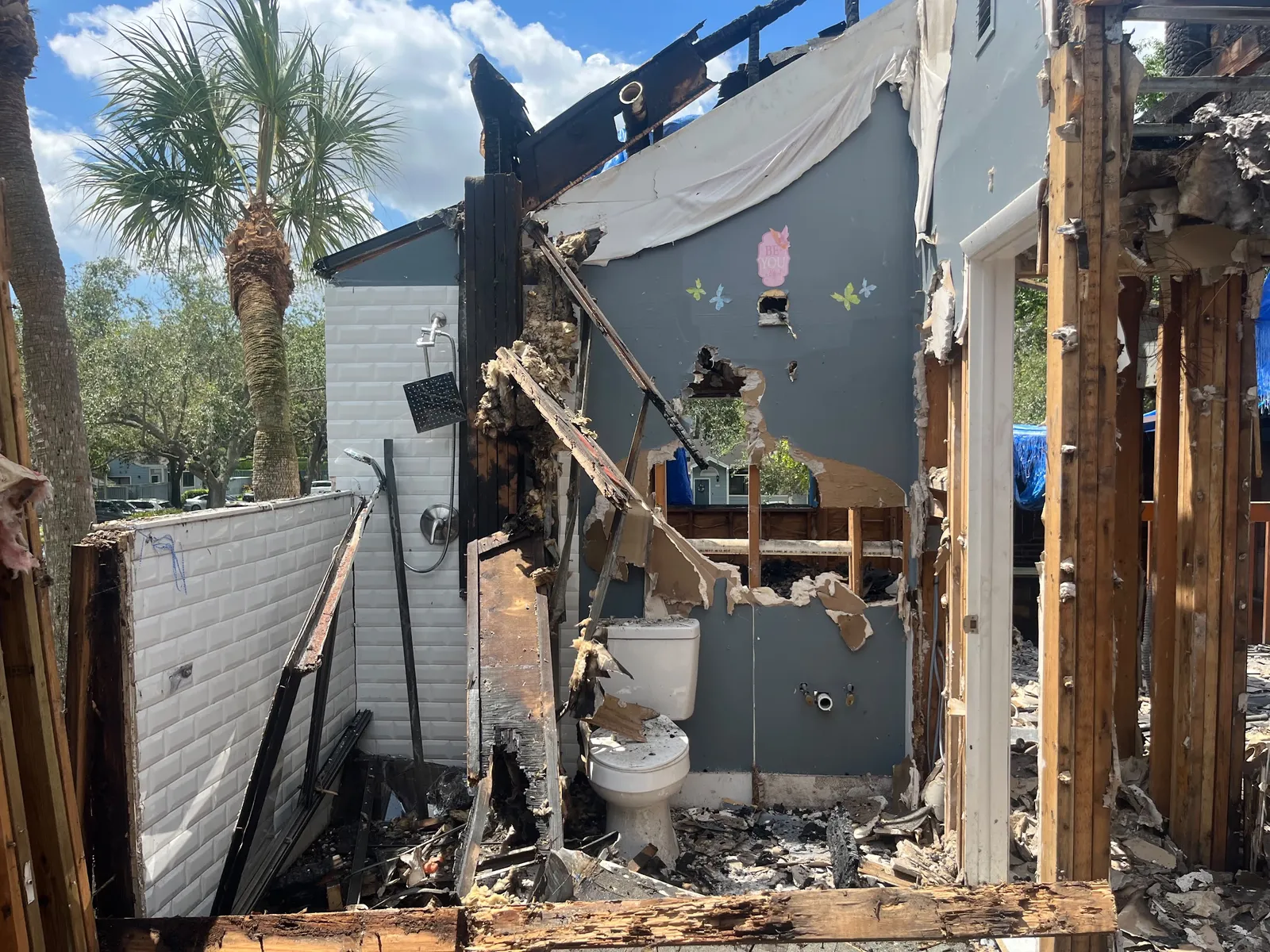 Bathroom exposed after fire damage removal