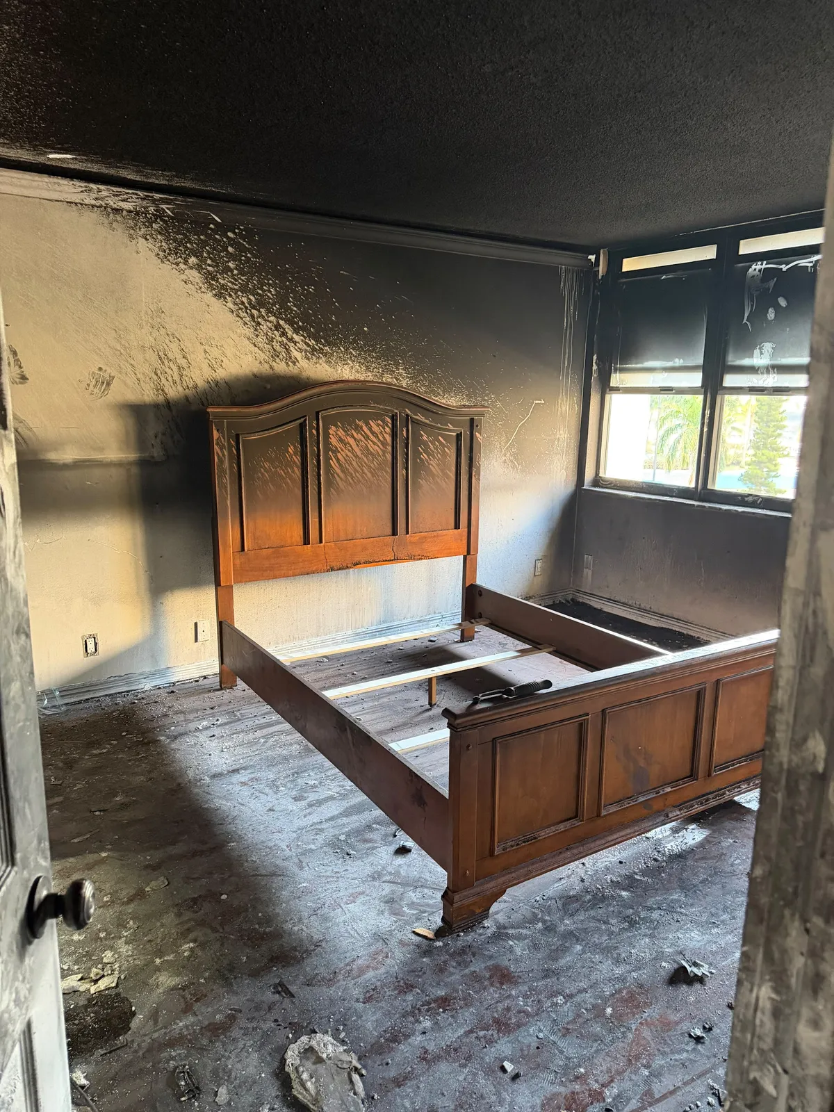 Bedroom interior charred by house fire