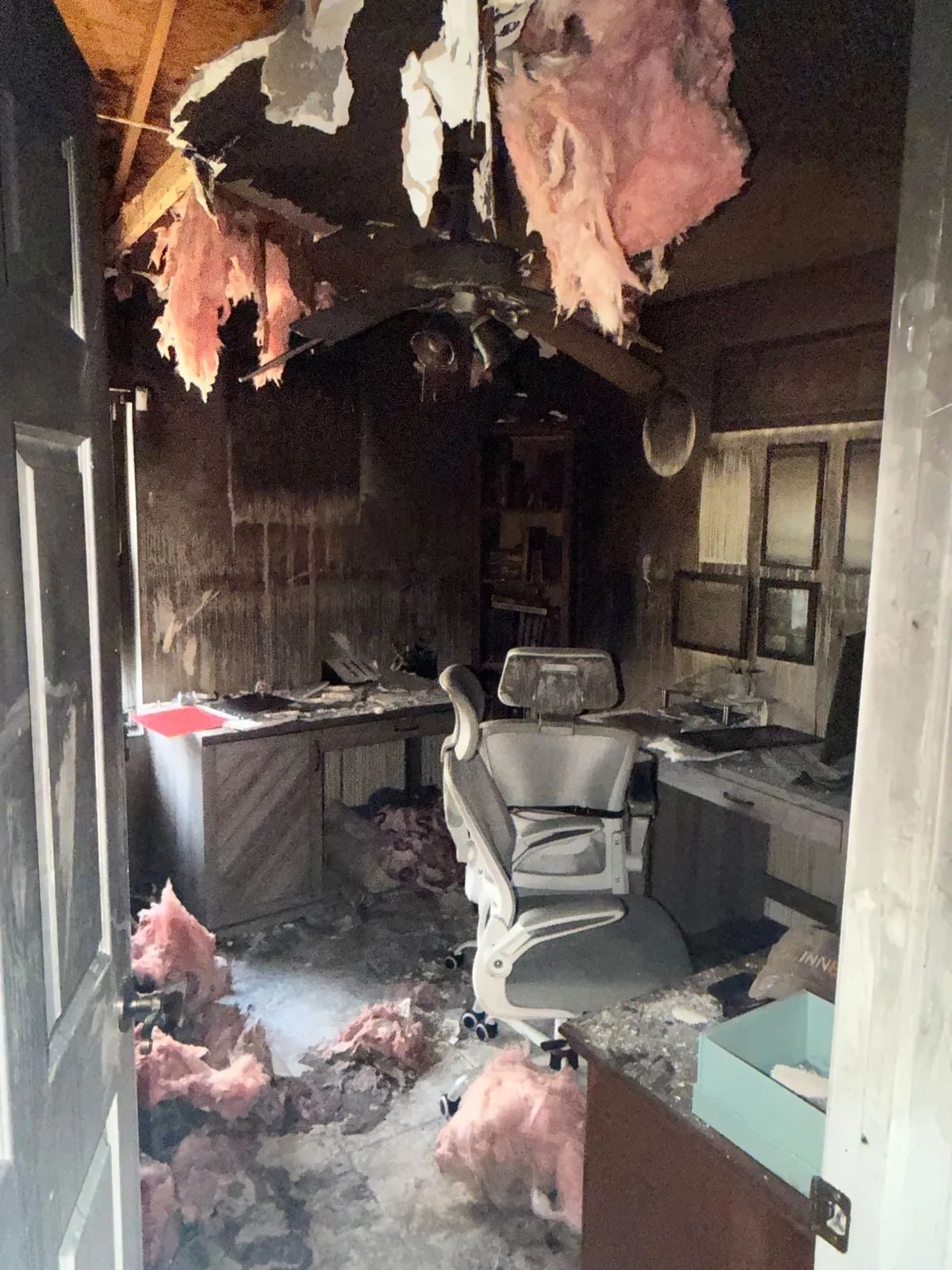 Wall and window area with smoke residue damage